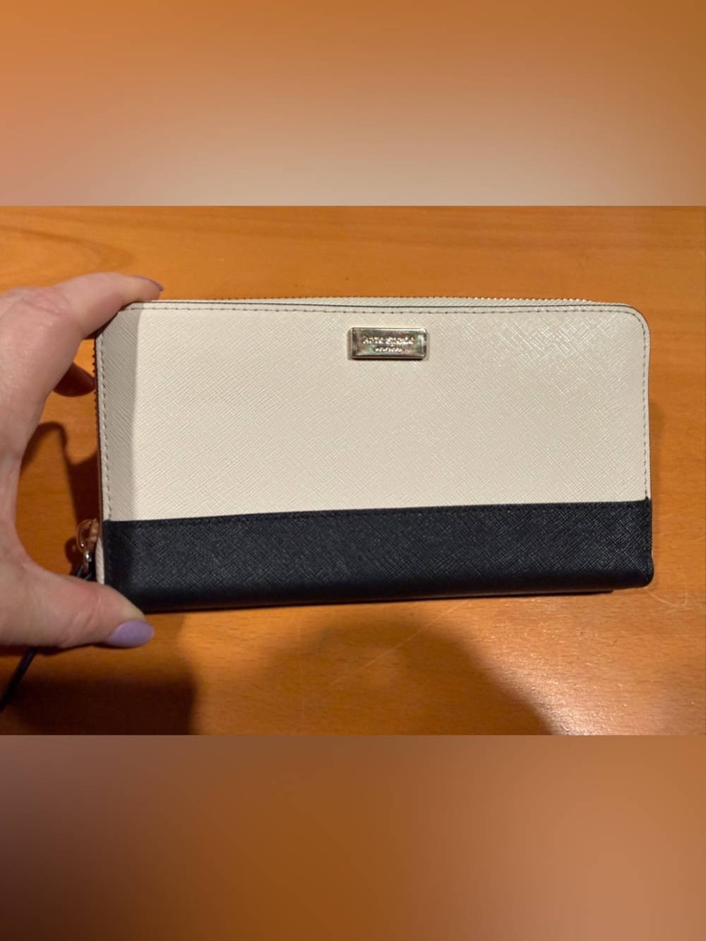 Kate Spade New York Laurel Way Neda continental wallet in a black and cream